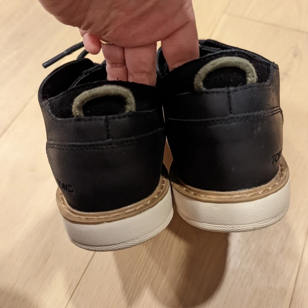 Toms step out